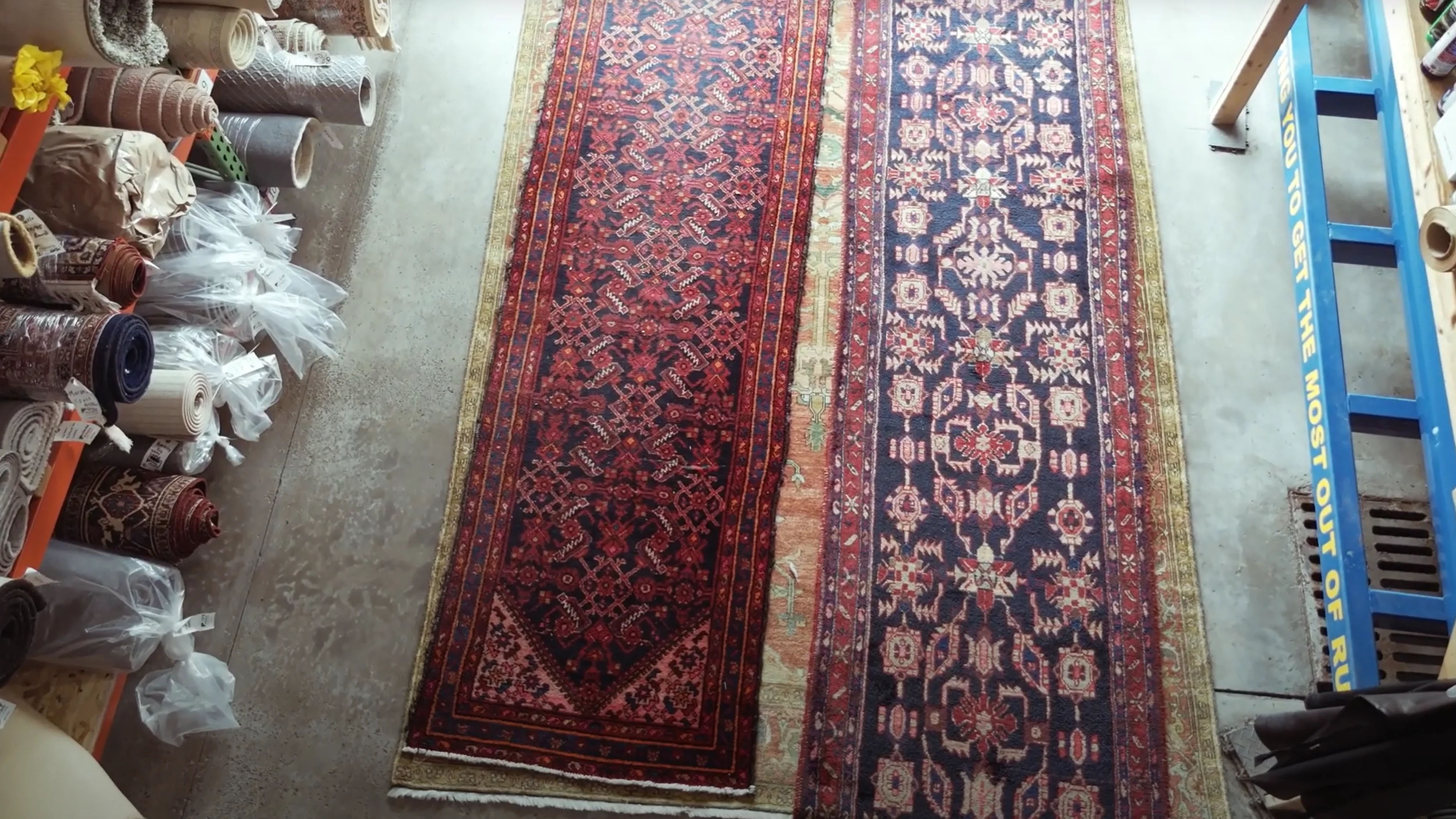 Collection of large area rugs at the Rug Life cleaning facility